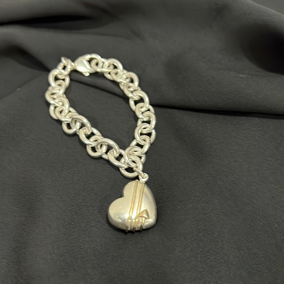 Sterling link with 14 kt gold accents Tiffany puffed heart bracelet. - Picture 1 of 5